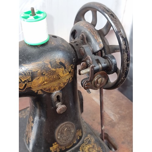 669 - Star Lot : A fab antique singer sewing machine with wooden work table and original foot pedal. Very ... 