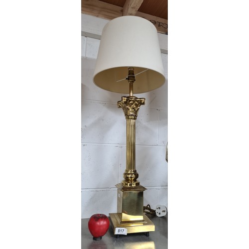 817 - A wonderful brass table lamp with shiny reeded column and classic white fabric shade.