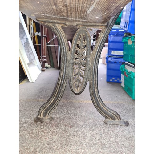 667 - Star Lot : A fabulous Large  antique Railway station bench, with heavy cast iron legs and solid wood... 