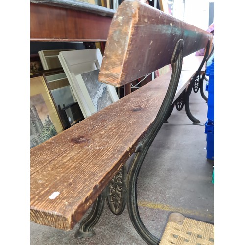 667 - Star Lot : A fabulous Large  antique Railway station bench, with heavy cast iron legs and solid wood... 