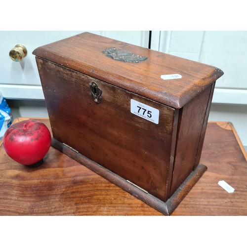 775 - A fantastic antique oak desk organizer featuring writing slope and dividers which contain an interes... 