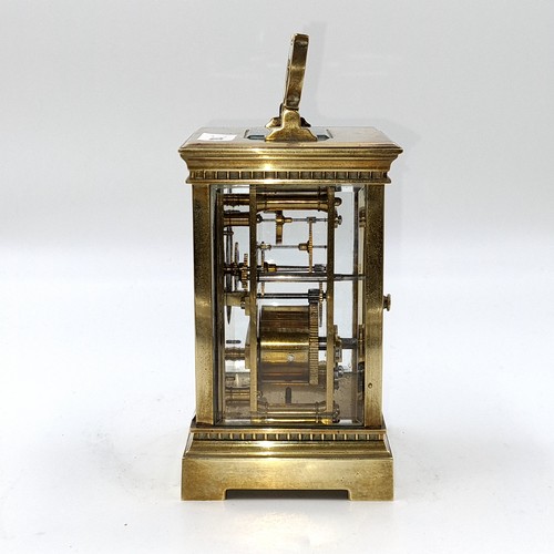 2 - Star Lot : A very good example of an antique brass carriage clock with brass fitted handle with glaz... 