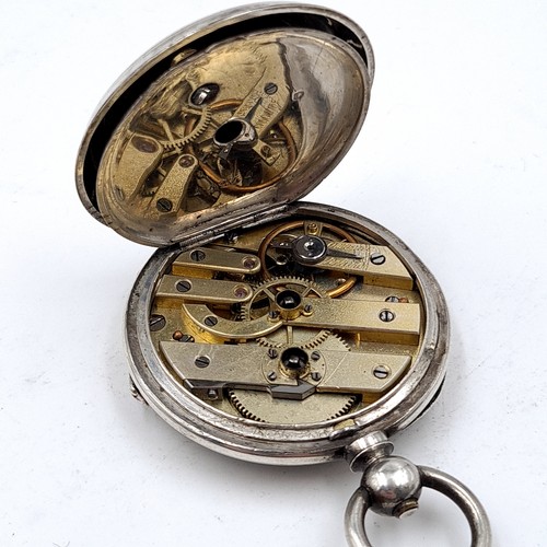 21 - A french sterling silver pocket watch with white enamel face roman numeral dial with floral design b... 