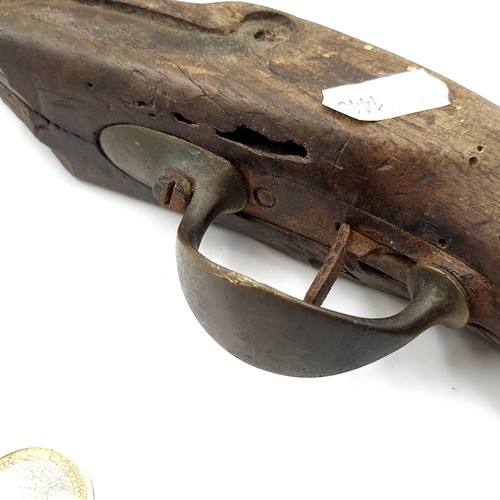 557 - A nineteenth century Musket pistol in poor condition but original. Length - 34 cms. Weight - 778 gra... 