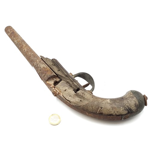 557 - A nineteenth century Musket pistol in poor condition but original. Length - 34 cms. Weight - 778 gra... 