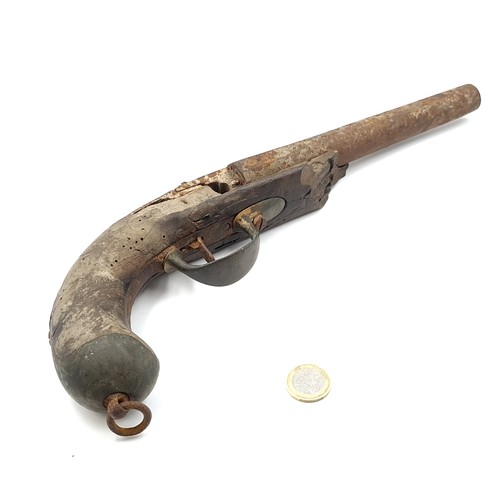 557 - A nineteenth century Musket pistol in poor condition but original. Length - 34 cms. Weight - 778 gra... 