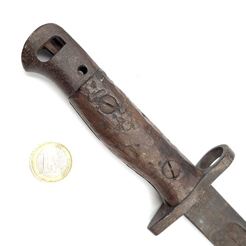 558 - An antique bayonet. Length - 53 cms. Blade - 41 cms. Weight - 470 grams.