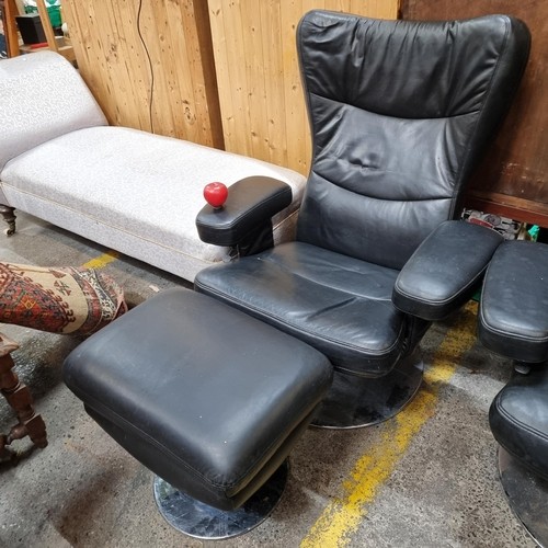 994 - Star Lot : A super stylish soft black Italian leather high wing recliner chair with armrests, chrome... 