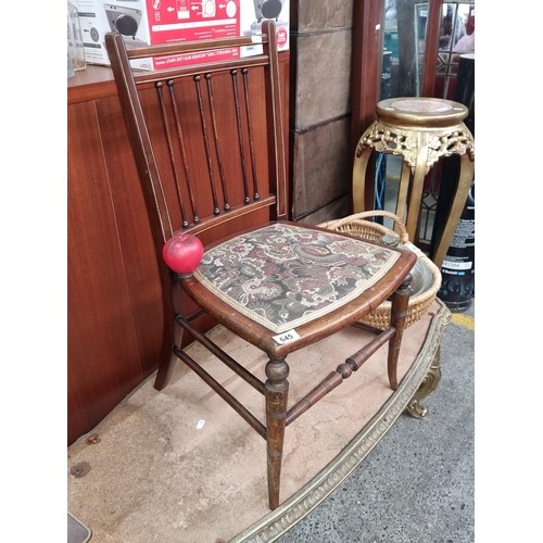 1004 - An antique Edwardian sheraton revival hall chair with string inlay, spindle back and upholstered sea... 