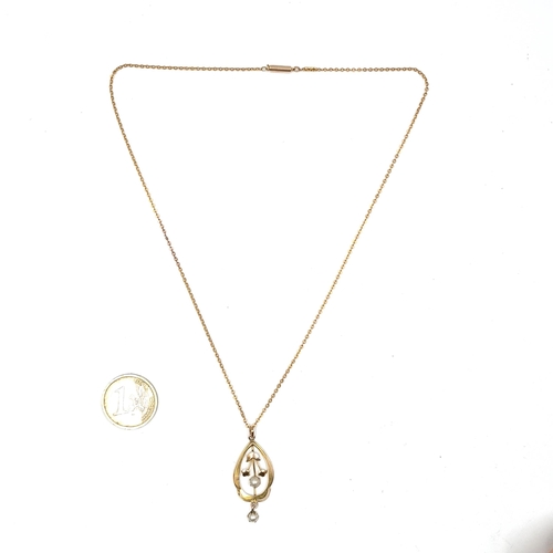 38 - A pretty example of a lovely Art Nouveau  nine carat gold pendant and chain. Pendant set in foliette... 