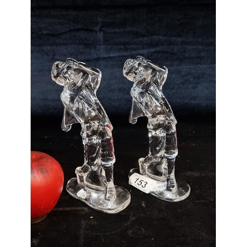 153 - A pair of striking Waterford Crystal golfers. In good condition with acid marks to base. Would make ... 