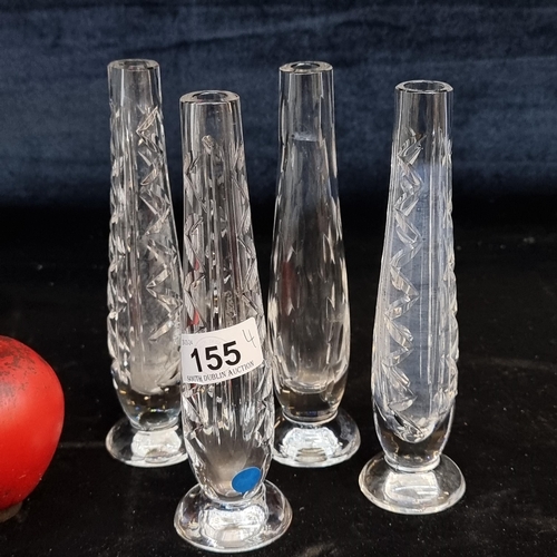 155 - Four elegant Waterford Crystal bud vases. All in good condition with acid marks to base.