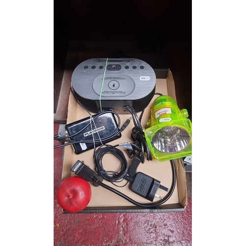 962 - Mixed lot of electronic items: Apple iPod docking station, assorted power adapters, and a green  lig... 