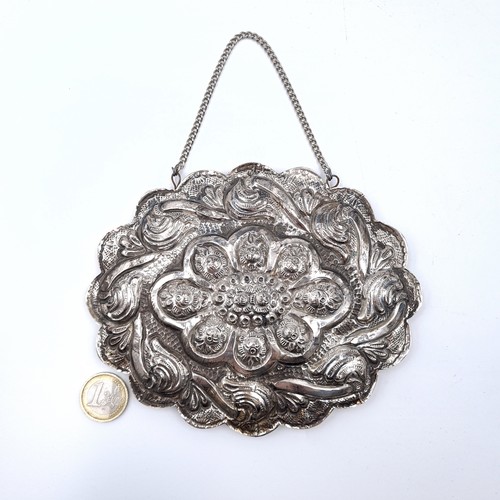 21 - A nice example of a sterling silver mirror set with Repousse foliette design. Dimensions - 16 x 12 c... 