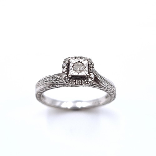 51 - A most attractive 9ct white gold diamond set cluster ring set with diamond shoulders. Estimated weig... 