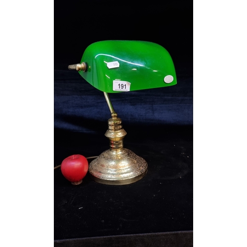 191 - A handsome brass bankers lamp with a hand blown green glass shade with a three pin plug.