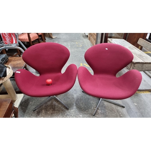 Star Lot : A fabulous Pair of brand new, we removed them from the box Swan swivel chairs After Fritz Hansen. In a lovely red upholstery, chrome bases. Sure pair of chairs. RRP 579 each. (original Fritz Hansen chairs are €4500 each and up)