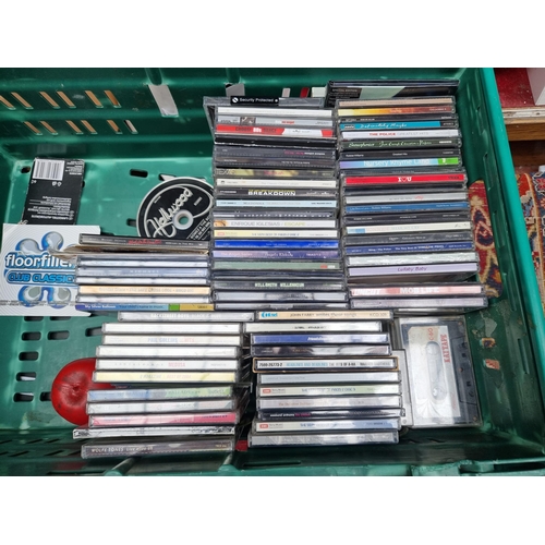 937 - A crate containing a large collection of CD's including artists such as The Pogue's, Phil Collins an... 