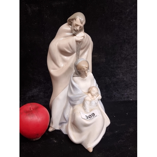 309 - A beautiful large piece of handmade NAO porcelain depicting Mary, Joseph and the baby Jesus.