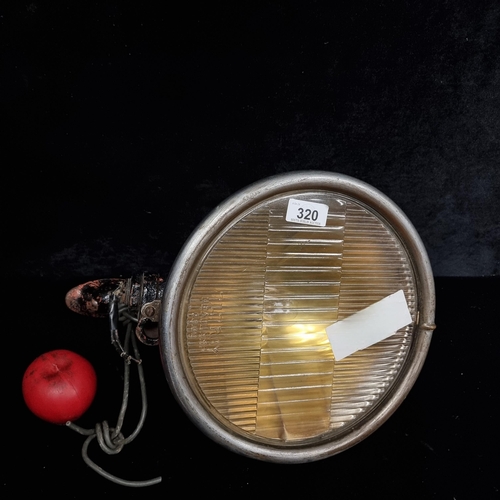 320 - A fantastic large antique American made Tilt Ray head lamp.