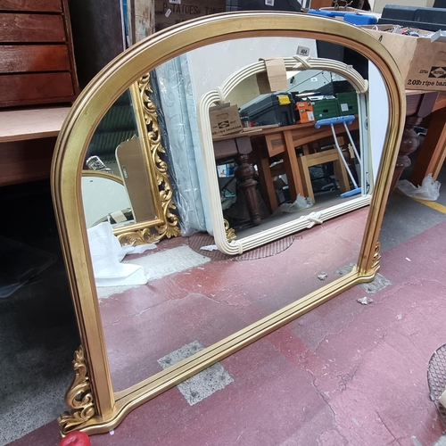 404 - Stra Lot : A gorgeous Gilt over mantel mirror housed in a gilt gold wooden frame with Rocco accents.... 