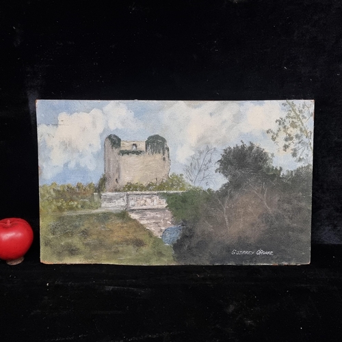 77 - A mid 21st century oil on board painting. Features a landscape with castle ruin. Signed 'Godfrey O'R... 