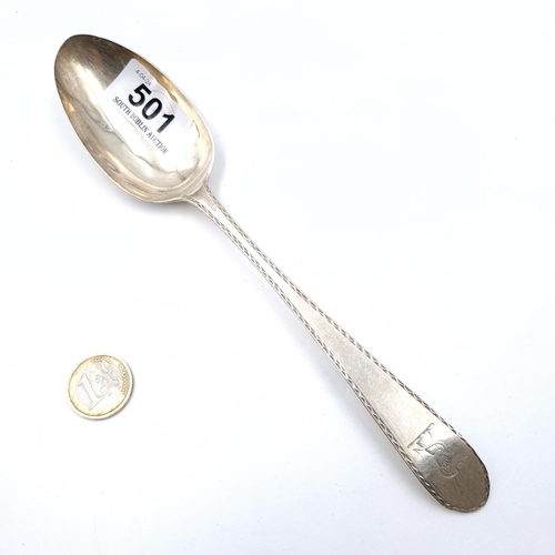 501 - An interesting large Irish silver bright cut serving spoon. Dated 1855. Length of spoon - 22 cms. Bo... 