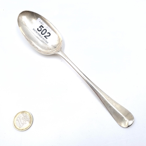 502 - An interesting large silver serving spoon hallmarked London. Dated - 1735. Marks slightly indistinct... 