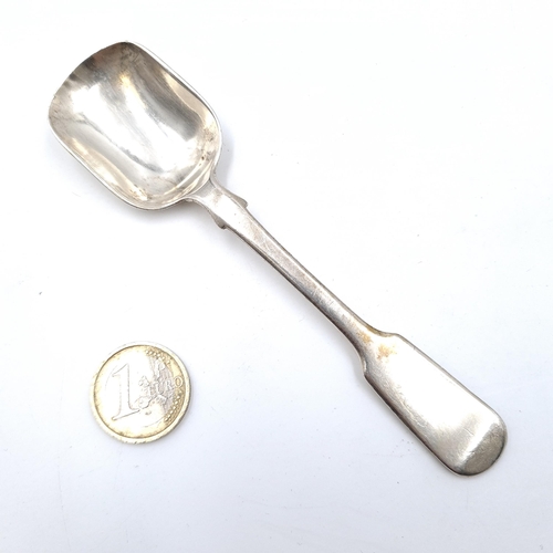 505 - A sterling silver sugar spoon, hallmarked London, 1836. Length of spoon - 14 cms. Weight - 30.2 gram... 