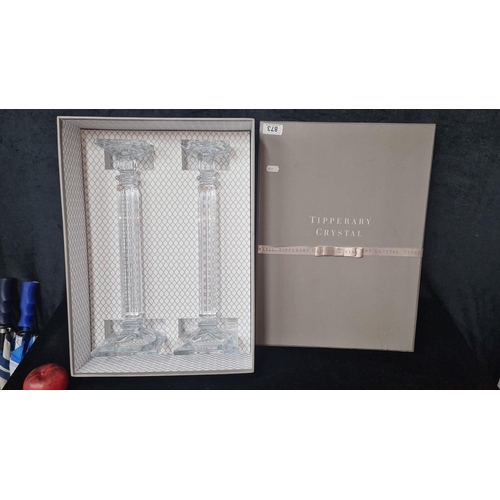 873 - A fabulous Tipperary Crystal candlestick pair featuring elegantly cut design. Boxed.