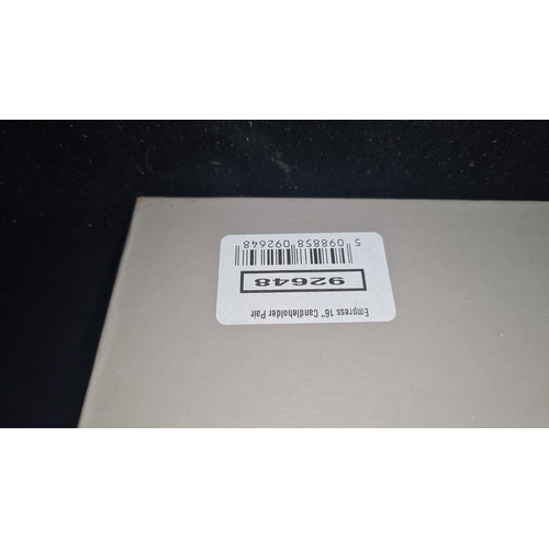 873 - A fabulous Tipperary Crystal candlestick pair featuring elegantly cut design. Boxed.