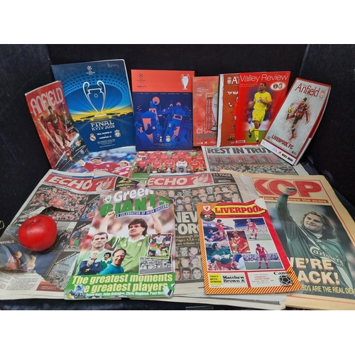 950 - A Liverpool FC duffel bag containing calendars, newspapers and programmes including The Champions Le... 