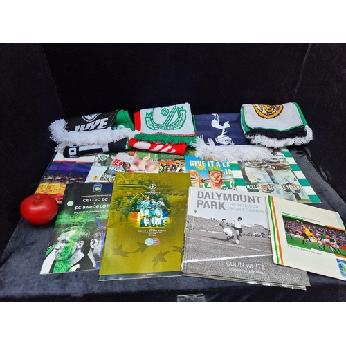 957 - A fantastic selection of football memorabilia including programmes and teams scarves.