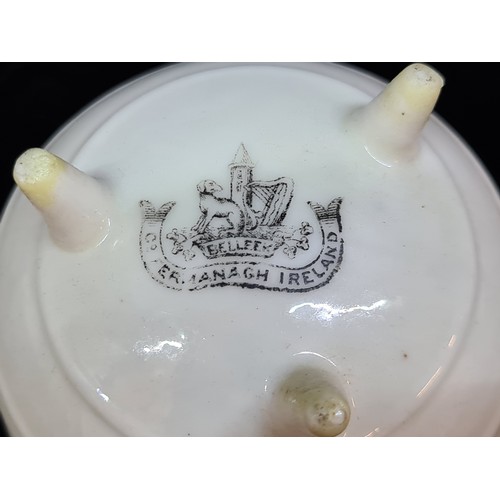 147 - An antique Black mark Belleek, Goss mini cauldron form KIllarney, Ireland