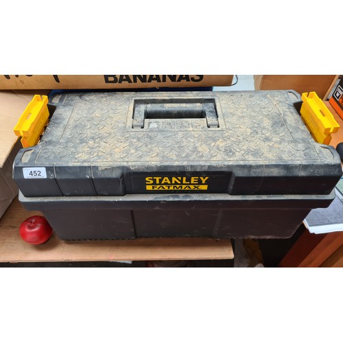 452 - A large Stanley FatMax hard shell tool box. A really good example. With built in bench.