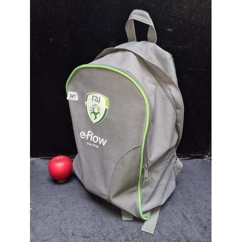 941 - An Irish FAI backpack containing a Irish football memorabilia including match programmes, commemorat... 