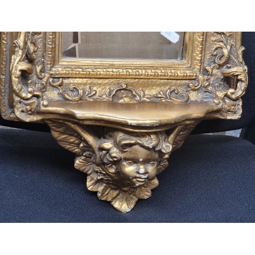 396 - Star lot : A fabulous vintage Rocco style bevelled wall mirror housed in a beautiful gilt gold frame... 