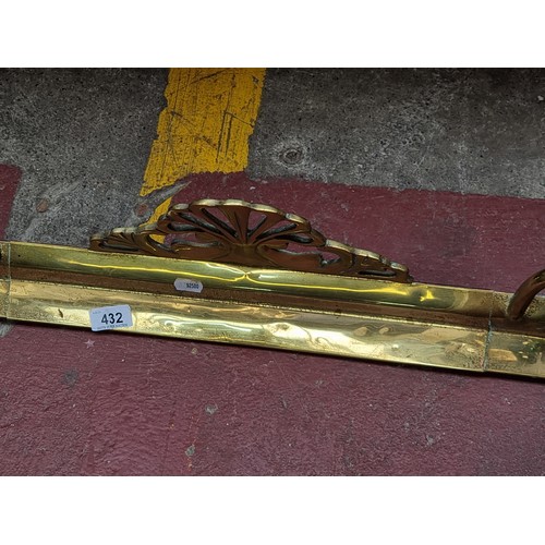 432 - A superb vintage brass fire fender with scroll detail. From the lovely house in Garville Avenue.  In... 