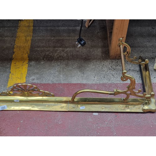 432 - A superb vintage brass fire fender with scroll detail. From the lovely house in Garville Avenue.  In... 