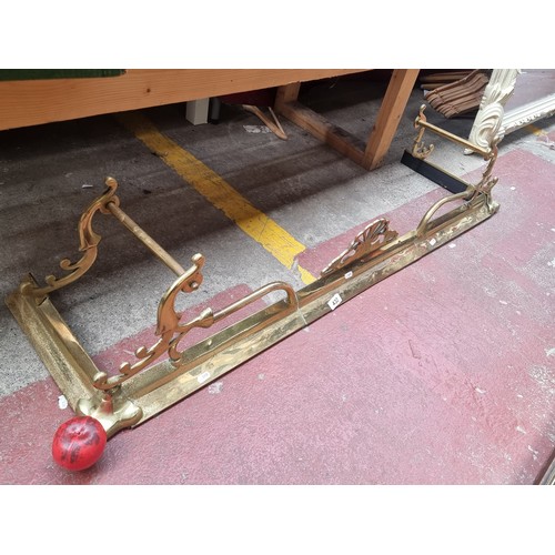 432 - A superb vintage brass fire fender with scroll detail. From the lovely house in Garville Avenue.  In... 