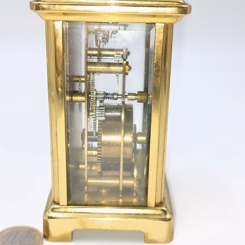 513 - Star Lot : A pretty French brass mechanical  carriage clock. Maker - Bayard, Paris . With white enam... 