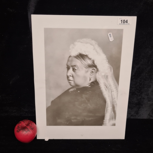 104 - An unusual printed glass panel featuring an 1890 photographic portrait of Queen Victoria.