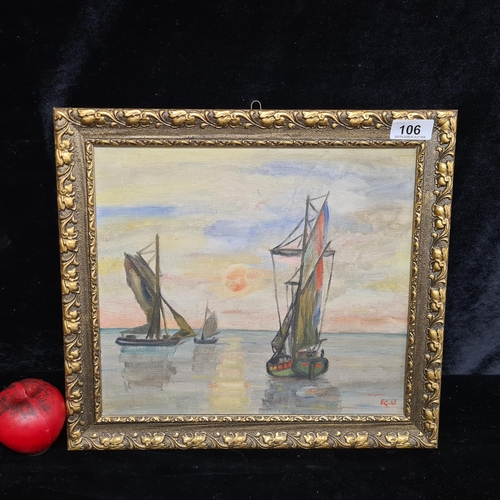 A handsome 1940's oil on board painting featuring a sun set scene with fishing boats. Initialled E.G. and dated 1940. Housed in a gilt frame.