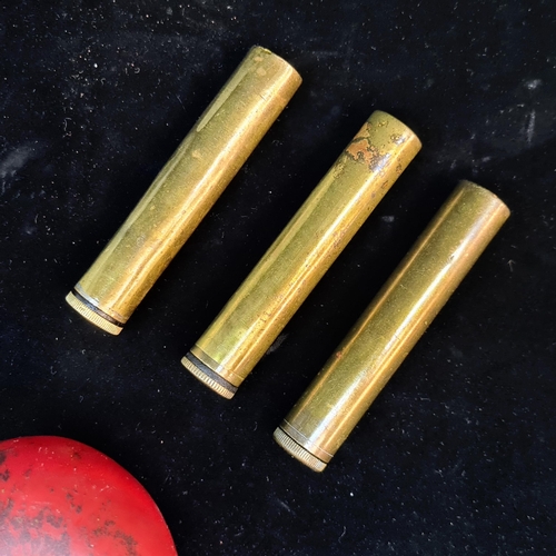 119 - Three brass oil bottles for Lee Enfield Rifles that would have been used during WWI and WWII.