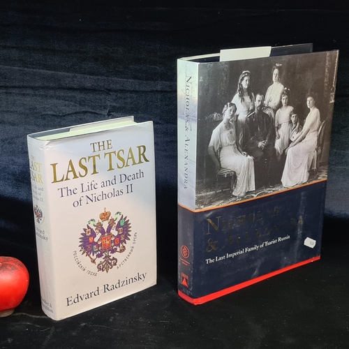 123 - Two hardback books covering the last imperial family of Tsarist Russia. Includes a very large and im... 