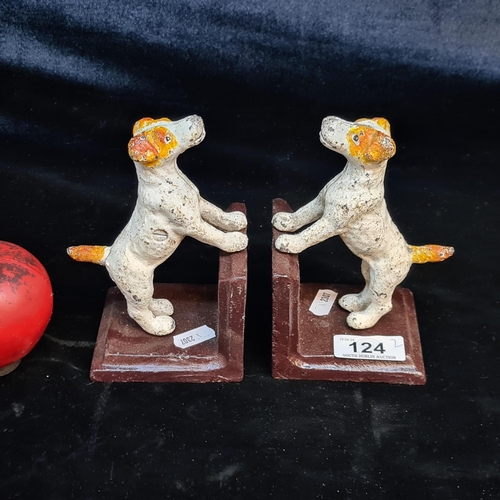 124 - Two heavy cast metal bookends in the form of dogs.