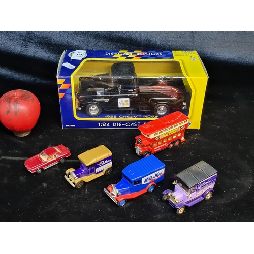 131 - A selection of six tin model cars including one new in box Motor Max 1:24 gauge Die-Cast replica mod... 