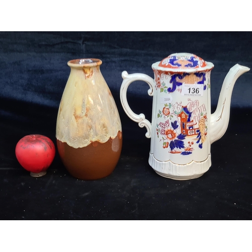 136 - Two stunning ceramic and porcelain items including a vase example along with an Imari patterned coff... 