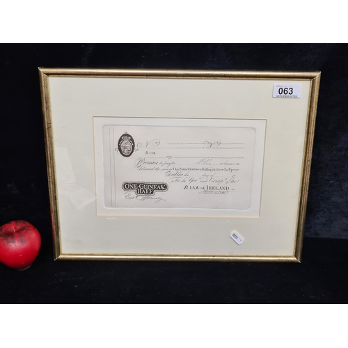 63 - A vintage plate etching of a 1798 Bank of Ireland cheque. Housed in a gilt frame behind glass.