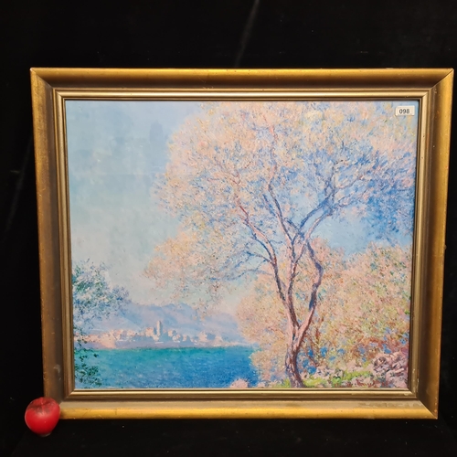 98 - A fabulous print originally by Claude Monet titled 'Antibes seen from La Salis. Housed in a gilt woo... 